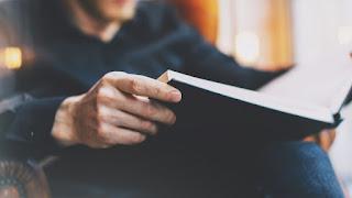 Person reading a book