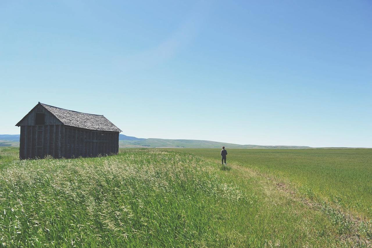 Rural landscape with barn and path