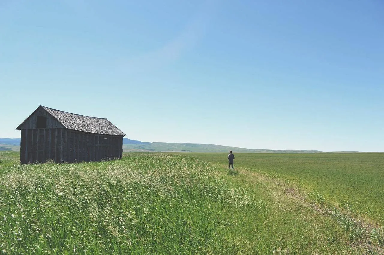 Rural landscape with barn and path