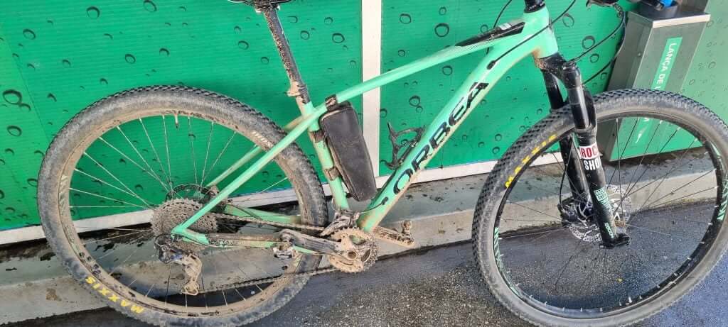 Dirty bike with green frame