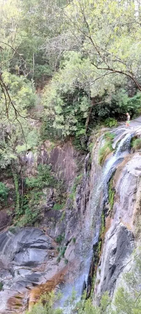 Cascatas de Fecha de Barjas waterfall surrounded by green rocks